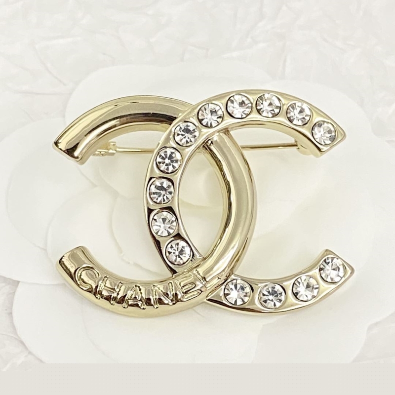 Ch*el brooches